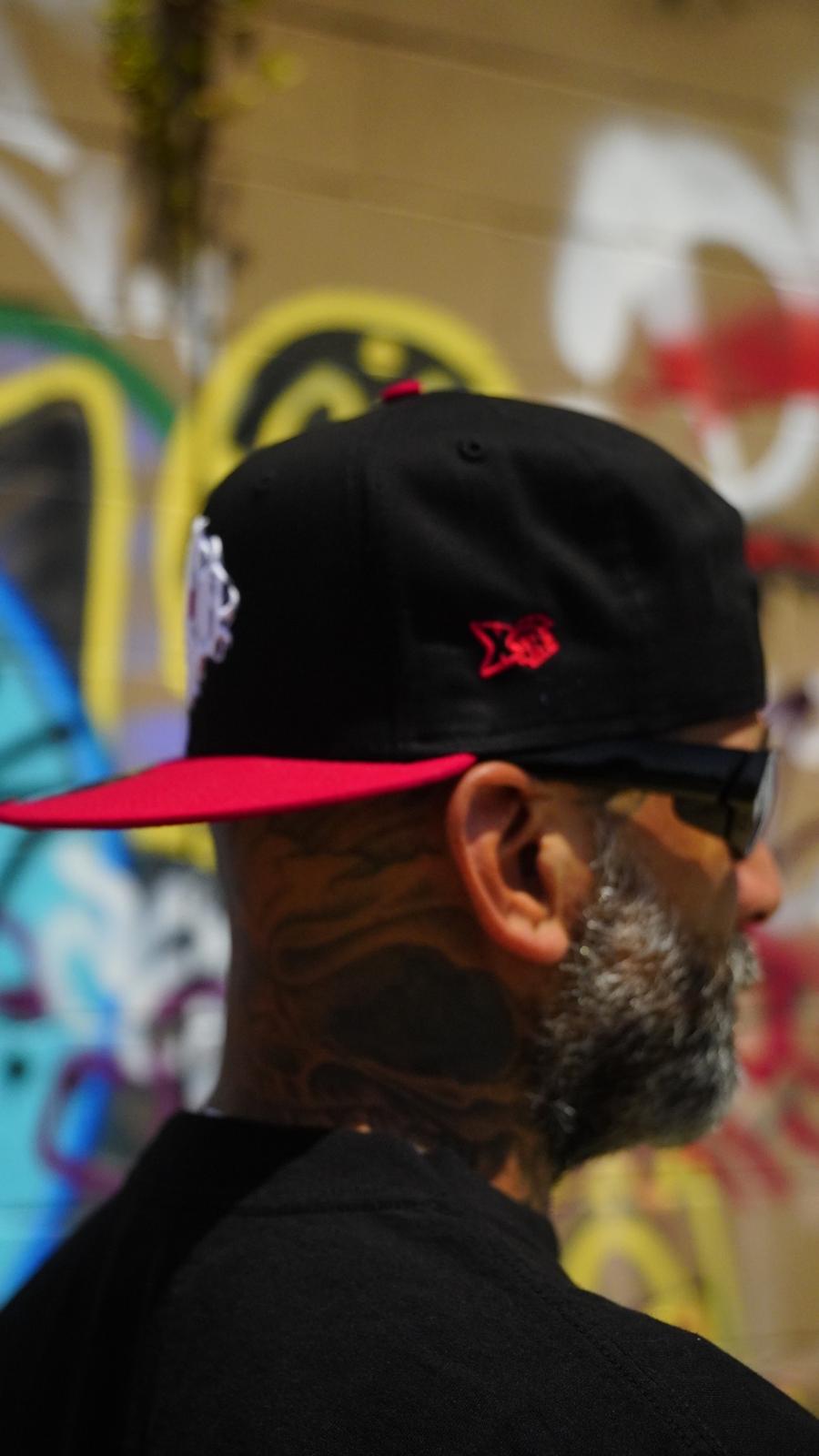 Signature Snapback — Black / Red Brim
